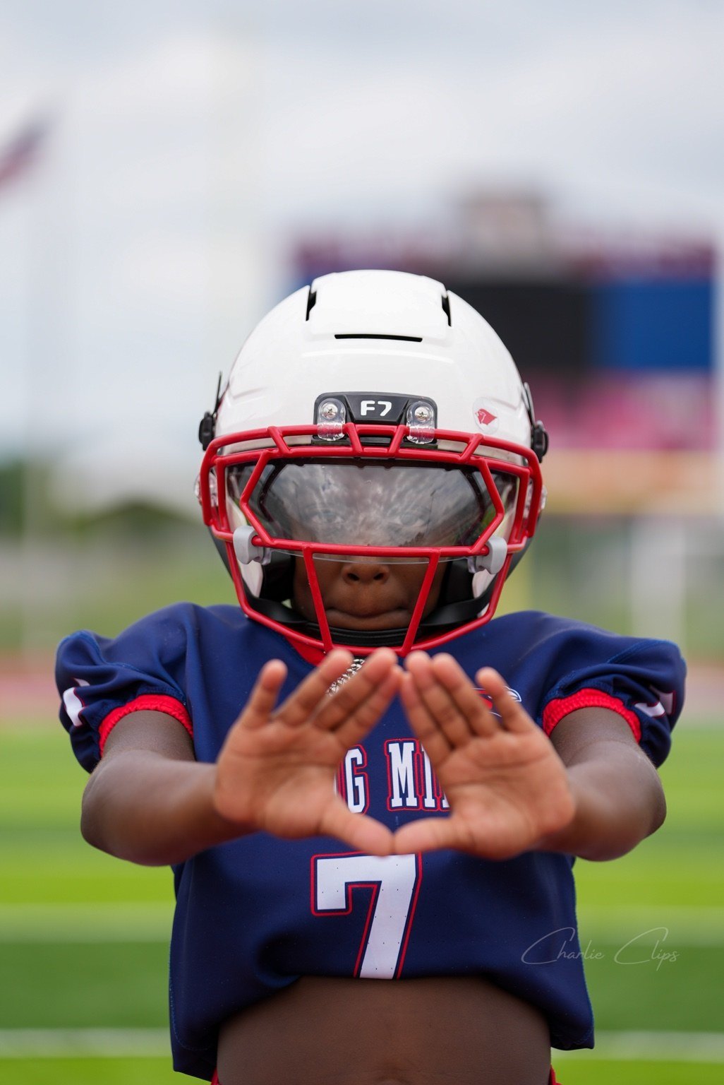 Youth football close portrait in helmet