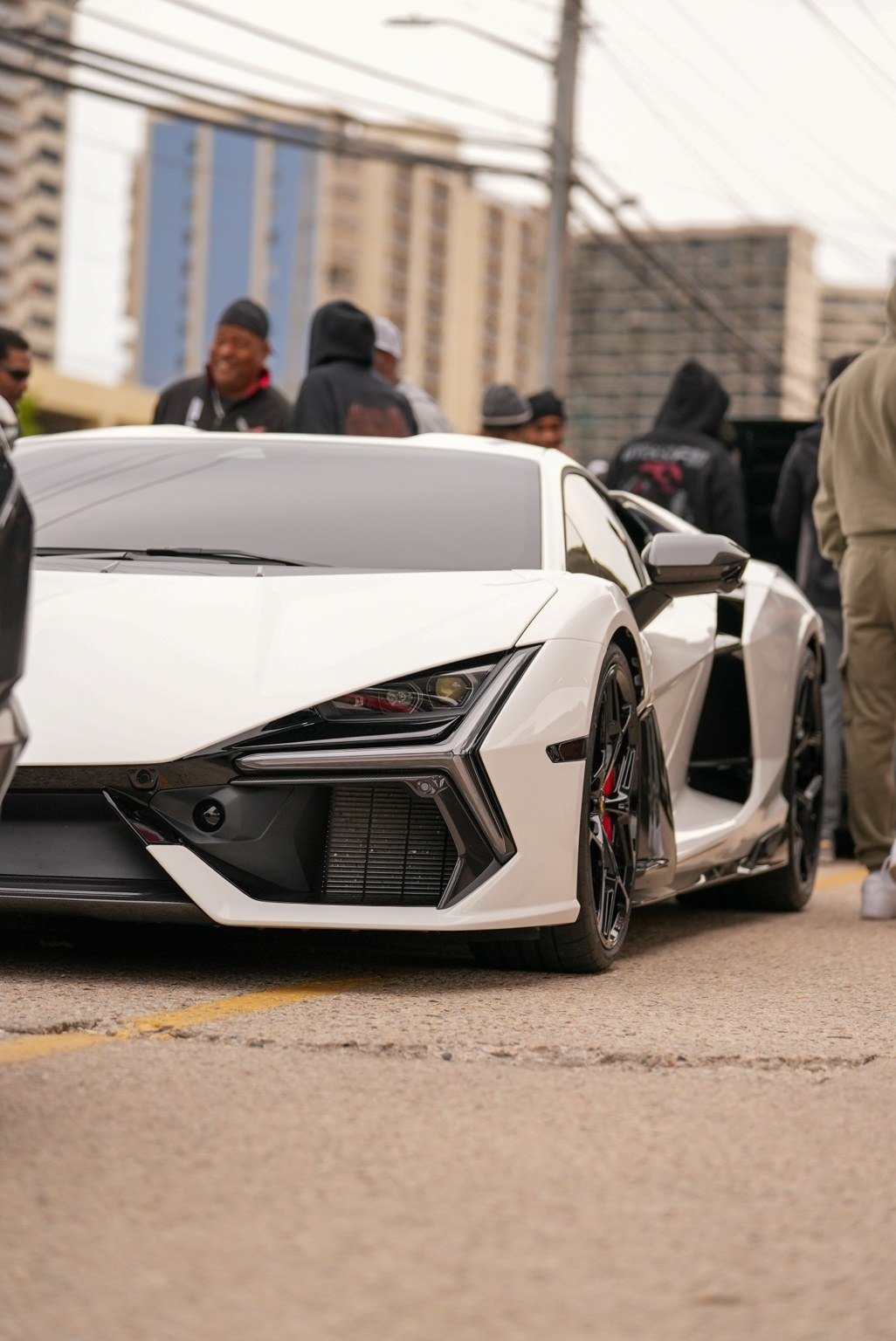 White exotic sports car low-angle view