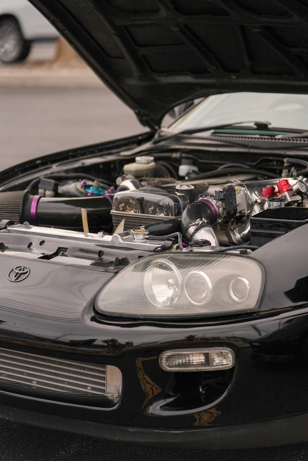 Green V8 Biturbo performance car detail